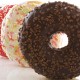 several donuts on a white background